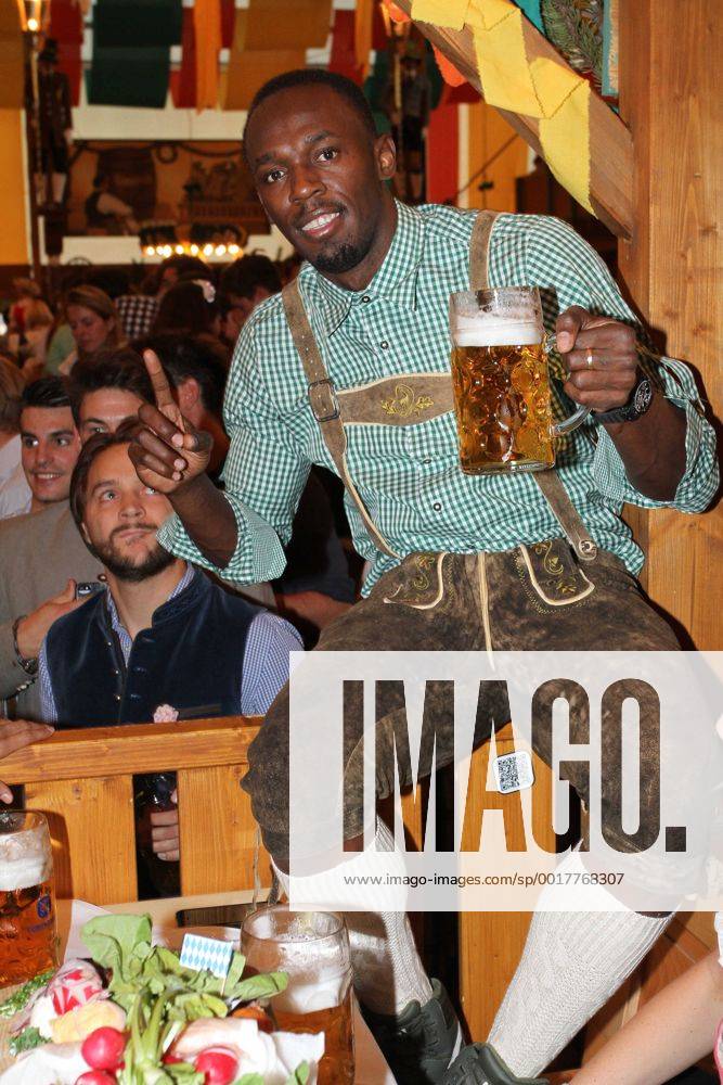 Usain Bolt, Wiesn 2014 Promis auf der Wiesn im Schuetzen Festzelt am Oktoberfest in München am 03.10.2014