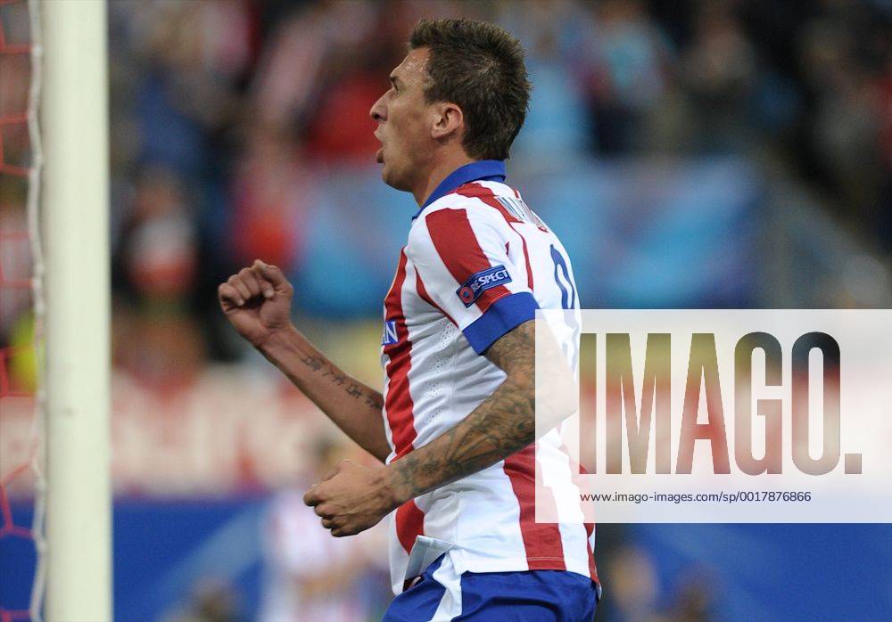 Atletico de Madrid Forward, Mario Mandzukic - MANDZUKIC, number 9 celebrates after scoring a goal (2,0). Round 3 of the CHAMPIONS league, soccer match between Atletico de Madrid - Malmo FF at the Vicente Calderon estadium, Madrid - Spain by October 22, 2014. PHOTO: MIguelLopez.