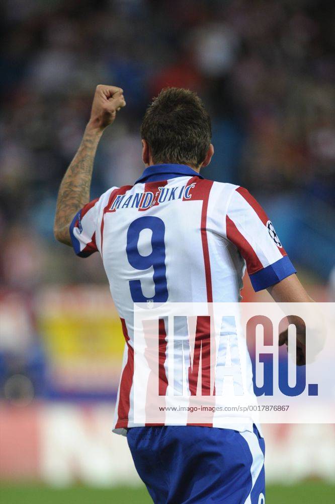 Atletico de Madrid Forward, Mario Mandzukic - MANDZUKIC, number 9 celebrates after scoring a goal (2,0). Round 3 of the CHAMPIONS league, soccer match between Atletico de Madrid - Malmo FF at the Vicente Calderon estadium, Madrid - Spain by October 22, 2014. PHOTO: MIguelLopez.