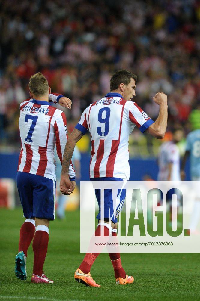 Atletico de Madrid Forward, Mario Mandzukic - MANDZUKIC, number 9 celebrates after scoring a goal (2,0). Atletico de Madrid Forward, Antoine Griezmann - GRIEZMANN, number 7. Round 3 of the CHAMPIONS league, soccer match between Atletico de Madrid - Malmo FF at the Vicente Calderon estadium, Madrid - Spain by October 22, 2014. PHOTO: MIguelLopez.