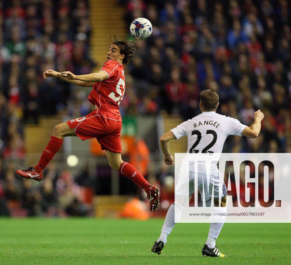 Liverpool s Lazer Markovic tussles with Swansea s Angel Rangel League Cup Fourth Round- Liverpool vs Swansea City - Anfield - England - 28th October 2014 - Picture David Klein Sportimage .