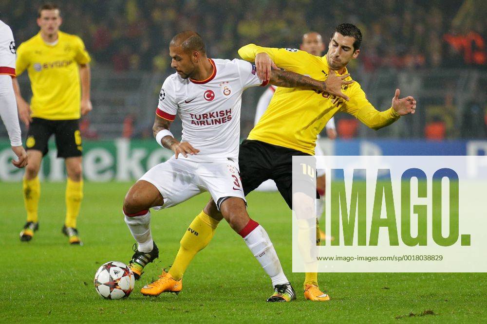 Aktuell Fussball, Champions League, Borussia Dortmund - Galatasaray Istanbul 04.11.2014, Fussball Champions League, Borussia Dortmund - Galatasaray Istanbul, v.l. Felipe Melo (Galatasaray Istanbul - 3) - Henrikh Mkhitaryan (BVB Borussia Dortmund - 10)