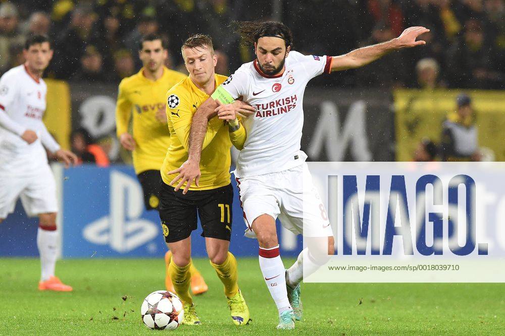 Aktuell Fussball, Champions League, Borussia Dortmund - Galatasaray Istanbul Fußball Champions League Borussia Dortmund - Galatasaray Istanbul am 04.11.2014 im Signal Iduna Park in Dortmund Marco Reus ( Dortmund ), links - Selcuk Inan ( Istanbul ), rechts