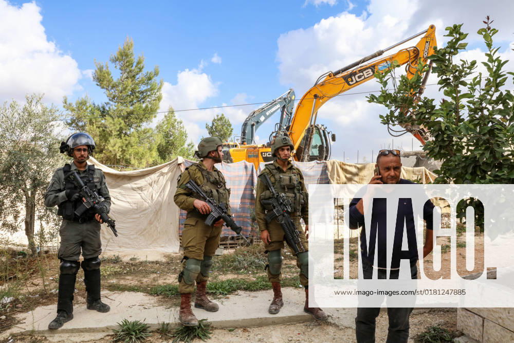 Israeli bulldozers demolish two Palestinian-owned houses in the village of al-Walaja, northwest of the West Bank city of Bethlehem Israeli bulldozers demolish two Palestinian-owned houses in the village of al-Walaja, northwest of the West Bank city of Bethlehem, Palestinain sources confirmed on November 2, 2022. Israeli forces raided the said village and demolished a house owned by local resident Othman al-Shweiki, and demolished another house owned by resident Khitam Ridwan. Photo by Ahmad Tayem APAimages Bethlehem West Bank Palestinian Territory 021122_Bethlehem_AT_00 (21)