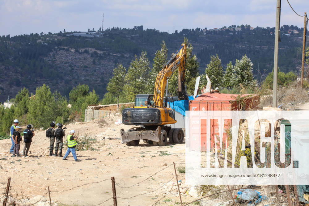 Israeli bulldozers demolish two Palestinian-owned houses in the village of al-Walaja, northwest of the West Bank city of Bethlehem Israeli bulldozers demolish two Palestinian-owned houses in the village of al-Walaja, northwest of the West Bank city of Bethlehem, Palestinain sources confirmed on November 2, 2022. Israeli forces raided the said village and demolished a house owned by local resident Othman al-Shweiki, and demolished another house owned by resident Khitam Ridwan. Photo by Ahmad Tayem APAimages Bethlehem West Bank Palestinian Territory 021122_Bethlehem_AT_00 (23)