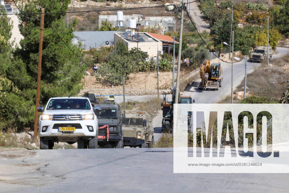 Israeli bulldozers demolish two Palestinian-owned houses in the village of al-Walaja, northwest of the West Bank city of Bethlehem Israeli bulldozers demolish two Palestinian-owned houses in the village of al-Walaja, northwest of the West Bank city of Bethlehem, Palestinain sources confirmed on November 2, 2022. Israeli forces raided the said village and demolished a house owned by local resident Othman al-Shweiki, and demolished another house owned by resident Khitam Ridwan. Photo by Ahmad Tayem APAimages Bethlehem West Bank Palestinian Territory 021122_Bethlehem_AT_00 (24)