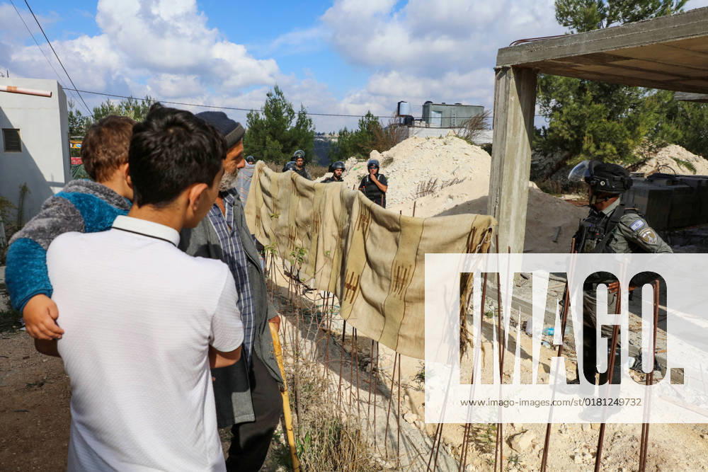 Israeli bulldozers demolish two Palestinian-owned houses in the village of al-Walaja, northwest of the West Bank city of Bethlehem Israeli bulldozers demolish two Palestinian-owned houses in the village of al-Walaja, northwest of the West Bank city of Bethlehem, Palestinain sources confirmed on November 2, 2022. Israeli forces raided the said village and demolished a house owned by local resident Othman al-Shweiki, and demolished another house owned by resident Khitam Ridwan. Photo by Ahmad Tayem APAimages Bethlehem West Bank Palestinian Territory 021122_Bethlehem_AT_00 (1)