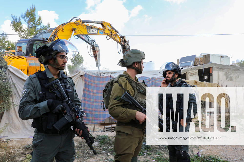 Israeli bulldozers demolish two Palestinian-owned houses in the village of al-Walaja, northwest of the West Bank city of Bethlehem Israeli bulldozers demolish two Palestinian-owned houses in the village of al-Walaja, northwest of the West Bank city of Bethlehem, Palestinain sources confirmed on November 2, 2022. Israeli forces raided the said village and demolished a house owned by local resident Othman al-Shweiki, and demolished another house owned by resident Khitam Ridwan. Photo by Ahmad Tayem APAimages Bethlehem West Bank Palestinian Territory 021122_Bethlehem_AT_00 (13)