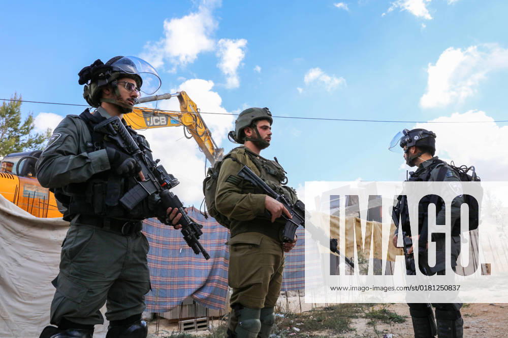 Israeli bulldozers demolish two Palestinian-owned houses in the village of al-Walaja, northwest of the West Bank city of Bethlehem Israeli bulldozers demolish two Palestinian-owned houses in the village of al-Walaja, northwest of the West Bank city of Bethlehem, Palestinain sources confirmed on November 2, 2022. Israeli forces raided the said village and demolished a house owned by local resident Othman al-Shweiki, and demolished another house owned by resident Khitam Ridwan. Photo by Ahmad Tayem APAimages Bethlehem West Bank Palestinian Territory 021122_Bethlehem_AT_00 (16)