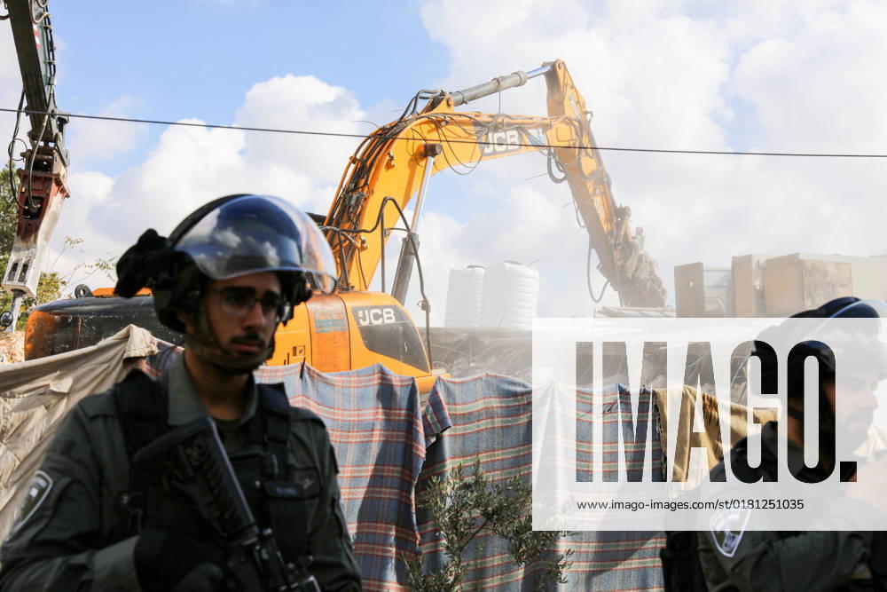 Israeli bulldozers demolish two Palestinian-owned houses in the village of al-Walaja, northwest of the West Bank city of Bethlehem Israeli bulldozers demolish two Palestinian-owned houses in the village of al-Walaja, northwest of the West Bank city of Bethlehem, Palestinain sources confirmed on November 2, 2022. Israeli forces raided the said village and demolished a house owned by local resident Othman al-Shweiki, and demolished another house owned by resident Khitam Ridwan. Photo by Ahmad Tayem APAimages Bethlehem West Bank Palestinian Territory 021122_Bethlehem_AT_00 (17)
