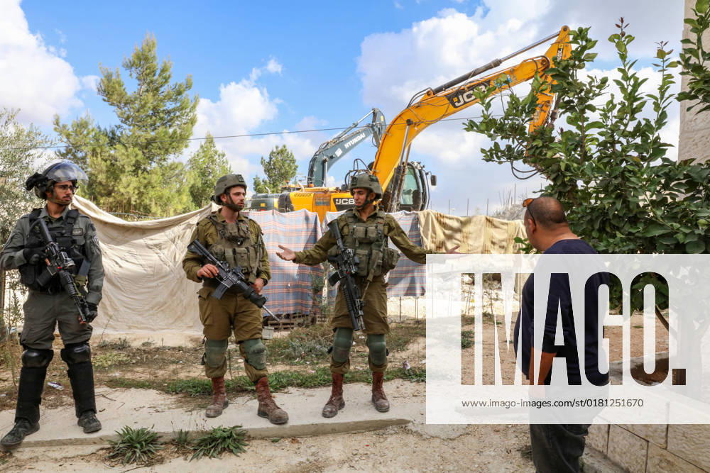 Israeli bulldozers demolish two Palestinian-owned houses in the village of al-Walaja, northwest of the West Bank city of Bethlehem Israeli bulldozers demolish two Palestinian-owned houses in the village of al-Walaja, northwest of the West Bank city of Bethlehem, Palestinain sources confirmed on November 2, 2022. Israeli forces raided the said village and demolished a house owned by local resident Othman al-Shweiki, and demolished another house owned by resident Khitam Ridwan. Photo by Ahmad Tayem APAimages Bethlehem West Bank Palestinian Territory 021122_Bethlehem_AT_00 (20)