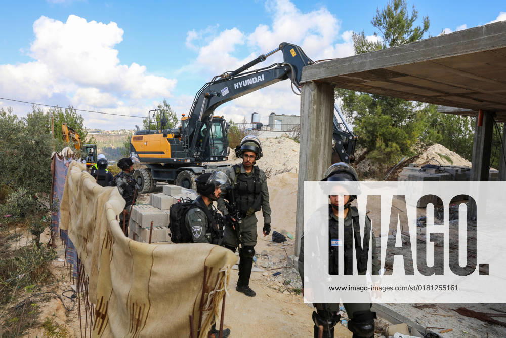 Israeli bulldozers demolish two Palestinian-owned houses in the village of al-Walaja, northwest of the West Bank city of Bethlehem Israeli bulldozers demolish two Palestinian-owned houses in the village of al-Walaja, northwest of the West Bank city of Bethlehem, Palestinain sources confirmed on November 2, 2022. Israeli forces raided the said village and demolished a house owned by local resident Othman al-Shweiki, and demolished another house owned by resident Khitam Ridwan. Photo by Ahmad Tayem APAimages Bethlehem West Bank Palestinian Territory 021122_Bethlehem_AT_00 (6)