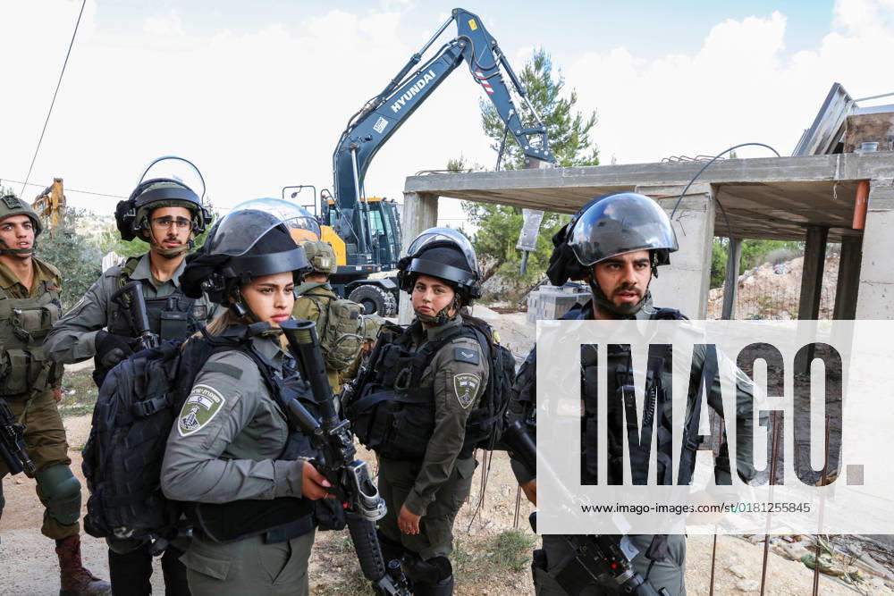 Israeli bulldozers demolish two Palestinian-owned houses in the village of al-Walaja, northwest of the West Bank city of Bethlehem Israeli bulldozers demolish two Palestinian-owned houses in the village of al-Walaja, northwest of the West Bank city of Bethlehem, Palestinain sources confirmed on November 2, 2022. Israeli forces raided the said village and demolished a house owned by local resident Othman al-Shweiki, and demolished another house owned by resident Khitam Ridwan. Photo by Ahmad Tayem APAimages Bethlehem West Bank Palestinian Territory 021122_Bethlehem_AT_00 (9)