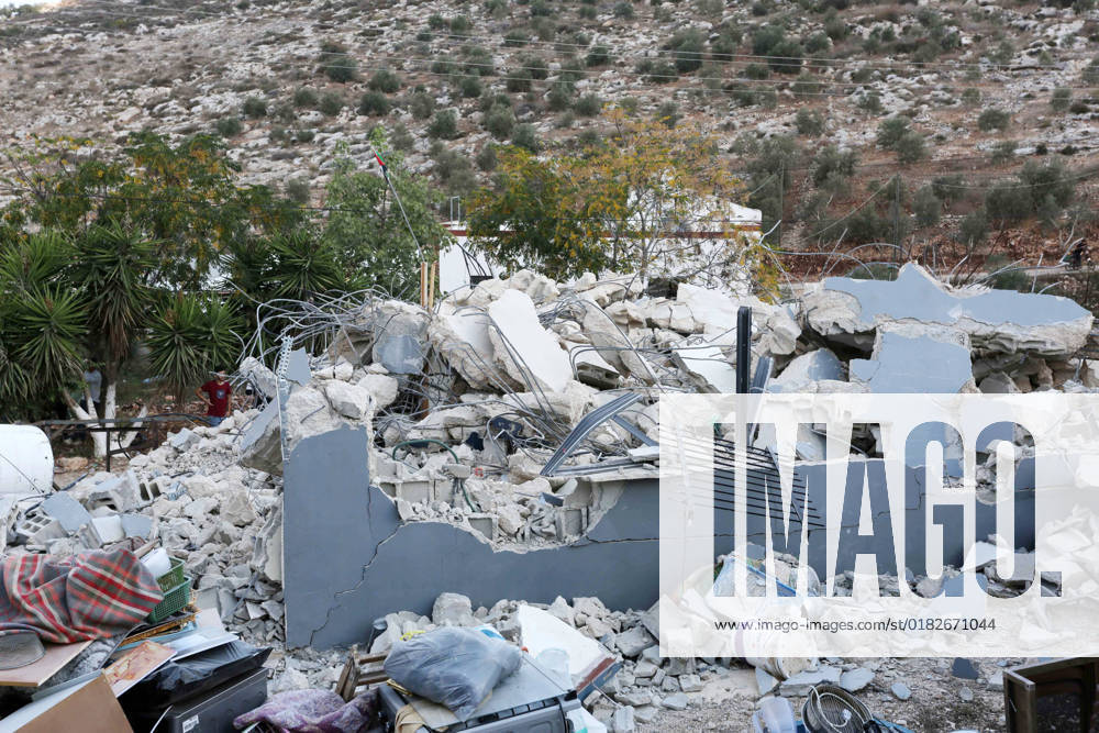 Palestinians inspect the rubble of their homes after Israeli forces demolish its, in the West Bank city of Jenin Palestinians inspect the rubble of their homes after Israeli forces demolish its, in the West Bank city of Jenin on November 2, 2022. Israeli bulldozers razed two houses in Jalbun village, northeast of Jenin city, according to local sources. Photo by Shadi Jarar ah apaimages Jenin West Bank Palestinian Territory 021122_JENIN_SHJ_00 (4)