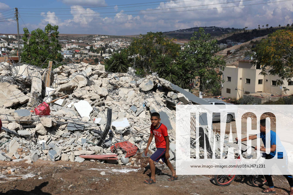 Palestinians inspect the rubble of their homes after Israeli forces demolish its, in the West Bank city of Jenin Palestinians inspect the rubble of their homes after Israeli forces demolish its, in the West Bank city of Jenin on November 2, 2022. Israeli bulldozers razed two houses in Jalbun village, northeast of Jenin city, according to local sources. Photo by Shadi Jarar ah apaimages Jenin West Bank Palestinian Territory 021122_JENIN_SHJ_00 (5)