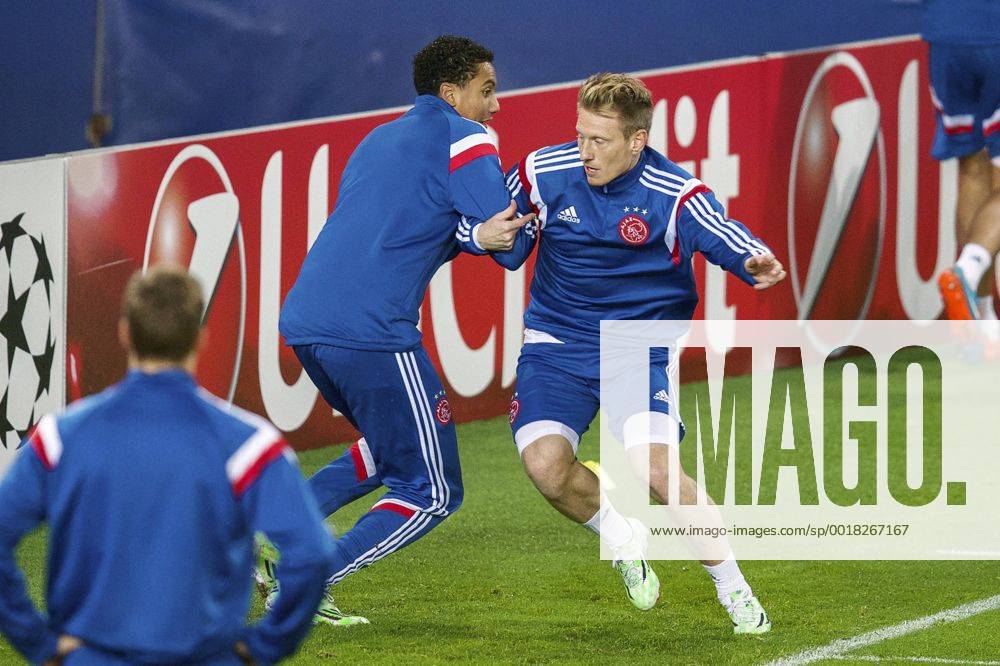 (L-R) Jairo Riedewald of Ajax, Niki Zimling of Ajax during a training session of Ajax Amsterdam prior to the UEFA Champions League group F match between Paris Saint-Germain and Ajax Amsterdam on November 24, 2014 at the Parc de Princes stadium in Paris, France. Training session Ajax UEFA Champions League Group F 2014 2015 IVx 3298927