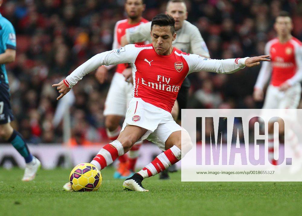 Football - 2014 2015 - Barclays Premier League, - Arsenal Vs Stoke City, Arsenal s Alexis Sanchez tries to chip the ball in from 30 yards at The Emirates Stadium ARS_STO
