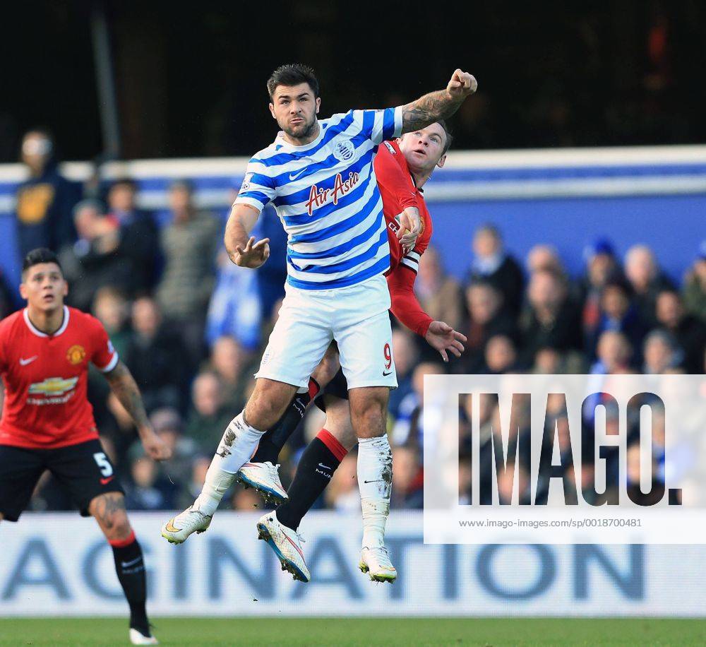 QPR s Charlie Austin tussles with Manchester United ManU s Wayne Rooney Barclays Premier League - Queens Park Rangers vs Manchester United - Loftus Road - England - 17th January 2015 - Picture David Klein Sportimage .