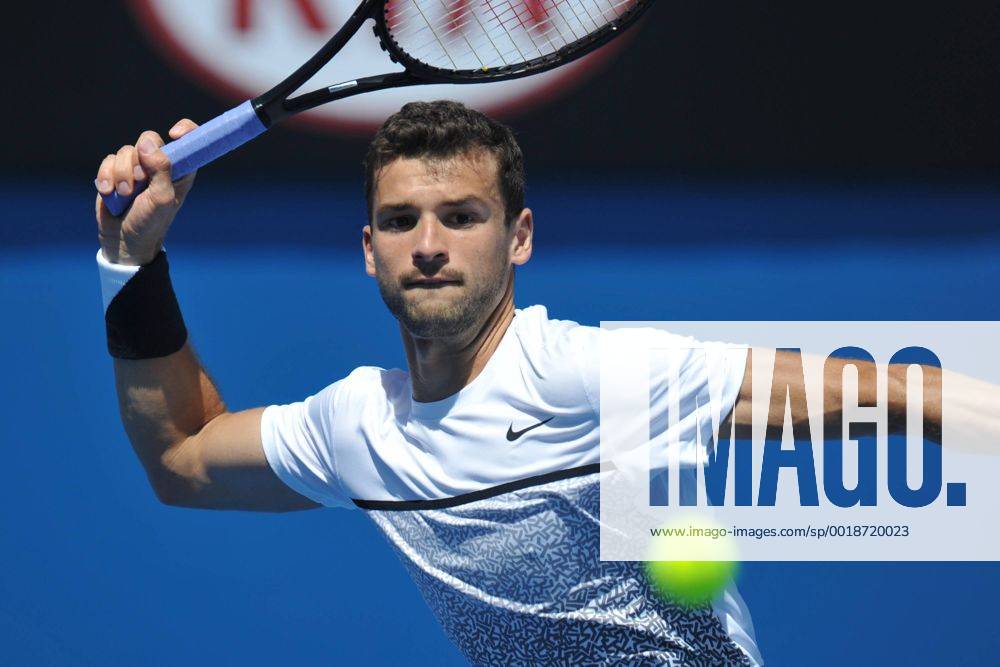 Australian Open Tennis from Melbourne Park. Grigor Dimitrov of Bulgaria hits a shot in his match on day one of the 2015 Australian Open at Melbourne Park, Melbourne, Australia. Limx ActionPlus11590736