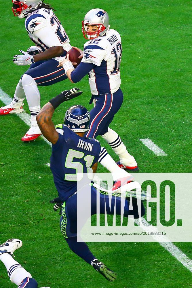 01 FEB 2015: New England Patriots quarterback Tom Brady (12) back to pass gets pressured by Seattle Seahawks outside linebacker Bruce Irvin (51) during the first quarter of Super Bowl XLIX being played at University of Phoenix Stadium. The New England Patriots defeat the Seattle Seahawks 28-24 in Super Bowl XLIX at University of Phoenix Stadium in Glendale Arizona. NFL American Football Herren USA FEB 01 Super Bowl XLIX - Patriots v Seahawks Icon020115327