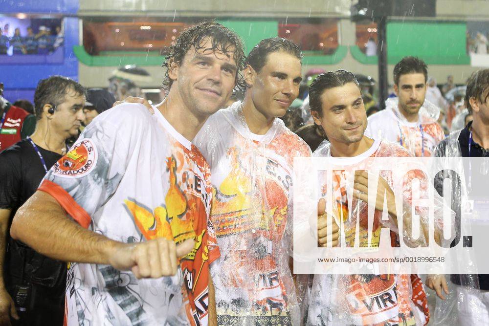 Gustavo Kuerten (L), Rafael Nadal (C) and David Ferrer (R) are seen prior to the performance of Special Groups of Samba Parade at the Sambadrome in Rio de Janeiro, Brazil, Feb. 15, 2015. XuxZijian