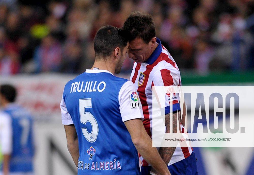Atletico de Madrid Forward, Mario Mandzukic - MANDZUKIC, number 9 . UD Almeria Defender, Angel Trujillo Canorea - TRUJILLO, number 5. Round 24 of the BBVA league, soccer match between Atletico de Madrid - UD Almeria at the Vicente Calderon estadium, Madrid - Spain by February 21, 2015.