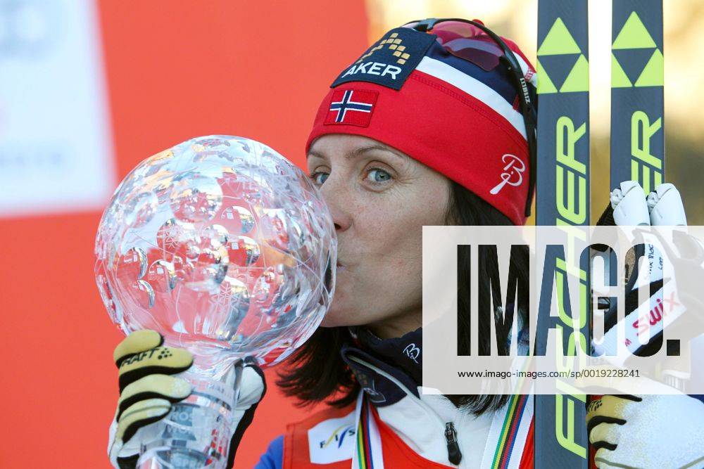 NORDIC SKIING - FIS WC Drammen DRAMMEN,NORWAY,11.MAR.15 - NORDIC SKIING, CROSS COUNTRY SKIING - FIS World Cup, sprint, ladies, award ceremony. Image shows Marit Bjoergen (NOR). Keywords: crystal globe, trophy.