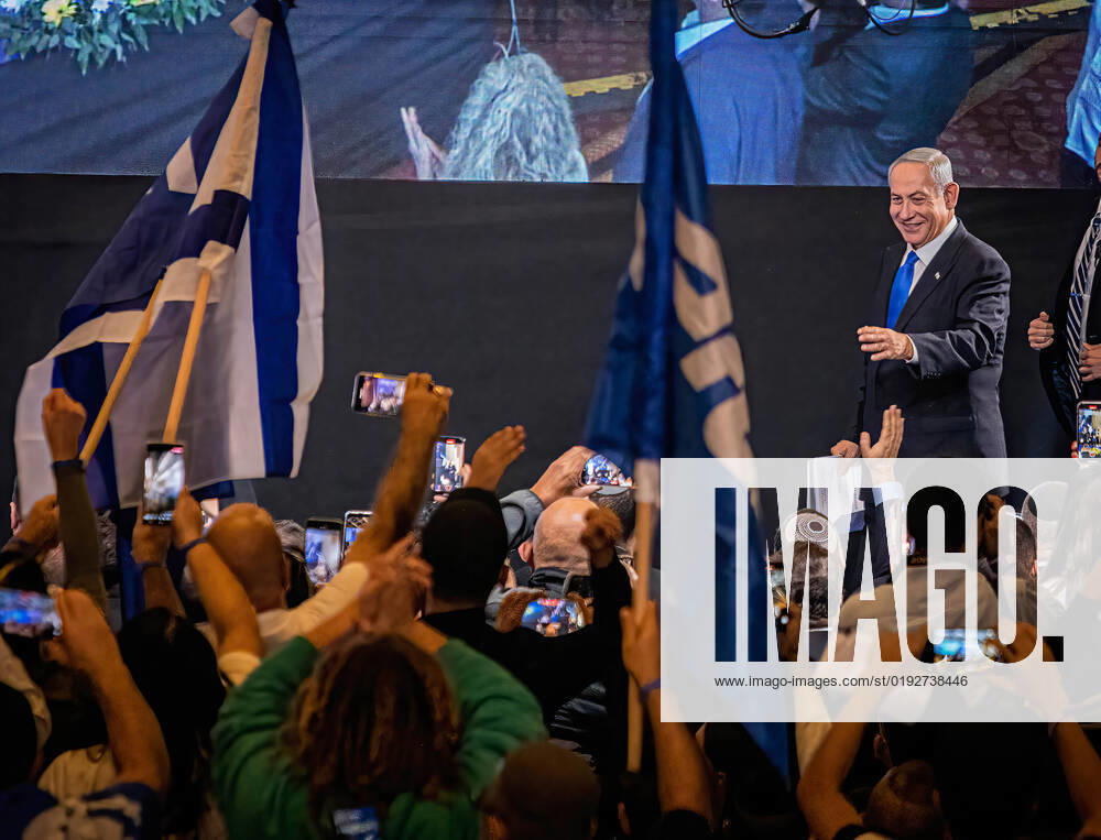 Former Israeli Prime Minister Benjamin Netanyahu interacts with supporters during the general elections celebrations. With more than 90% of the votes counted former Israeli Prime Minister Benjamin Netanyahu and his block of parties are set to win 65 seats out of the 120 seat Parliament. A come back for Netanyahu, the religious and extreme right nationalist block that he leads. Jerusalem Israel - ZUMAs197 20221102_zaa_s197_497