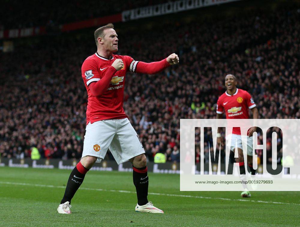 Wayne Rooney of Manchester United ManU celebrates scoring the third goal with a reference to a story that he had been knocked out in his kitchen while play boxing - Barclays Premier League - Manchester Utd vs Tottenham - Old Trafford Stadium - Manchester - England - 15th March 2015 - Picture Simon Bellis Sportimage .
