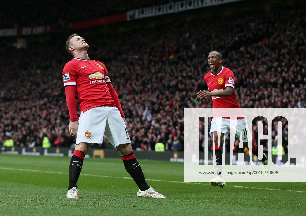 Wayne Rooney of Manchester United ManU celebrates scoring the third goal with a reference to a story that he had been knocked out in his kitchen while play boxing - Barclays Premier League - Manchester Utd vs Tottenham - Old Trafford Stadium - Manchester - England - 15th March 2015 - Picture Simon Bellis Sportimage .