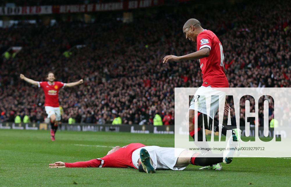 Wayne Rooney of Manchester United ManU celebrates scoring the third goal with a reference to a story that he had been knocked out in his kitchen while play boxing - Barclays Premier League - Manchester Utd vs Tottenham - Old Trafford Stadium - Manchester - England - 15th March 2015 - Picture Simon Bellis Sportimage .