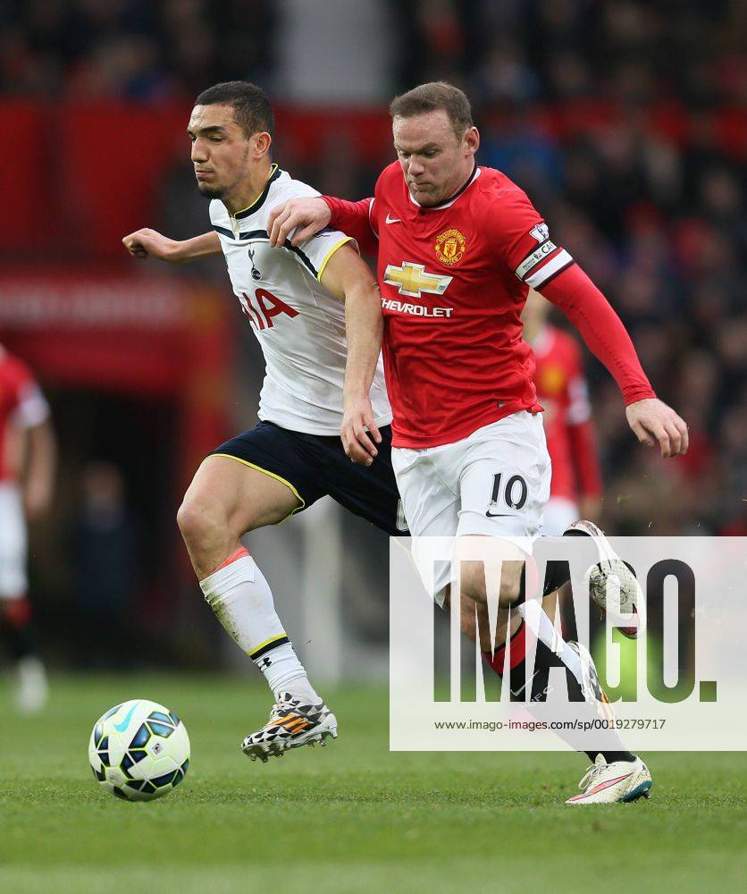 Wayne Rooney of Manchester United ManU tussles with Nabil Bentaleb of Tottenham - Barclays Premier League - Manchester Utd vs Tottenham - Old Trafford Stadium - Manchester - England - 15th March 2015 - Picture Simon Bellis Sportimage .