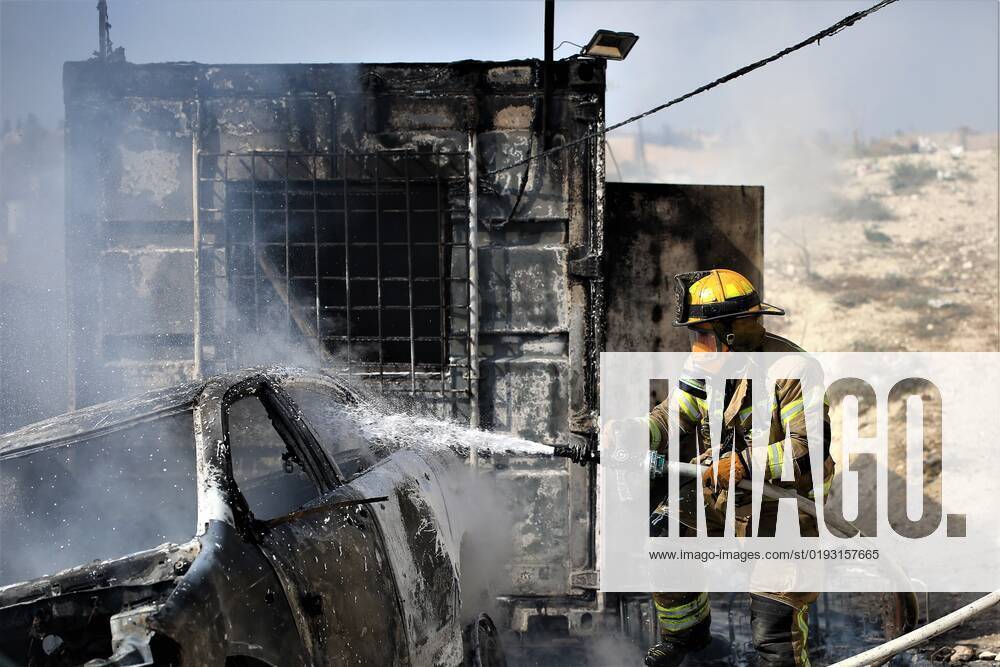 Fire Crew In Jerusalem Fire crews in the city of Jerusalem extinguish a fire that broke out in the property of an Arab citizen, in the town of Ras al-Amud, south of Jerusalem, November 5, 2022 Jerusalem Israel