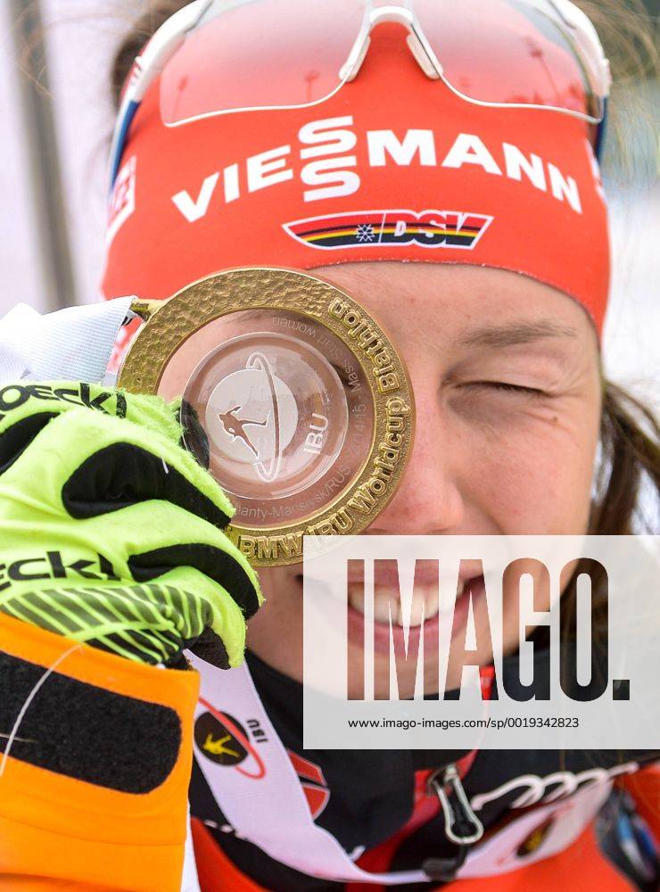 KHANTY-MANSIYSK, RUSSIA. MARCH 22, 2015. Gold medalist, biathlete Laura Dahlmeier of Germany poses with her medal after an awards ceremony for the women s 12,5km mass start event at the 2014 15 Season IBU Biathlon World Cup stage in Khanty-Mansiysk, Russia. RE15F267