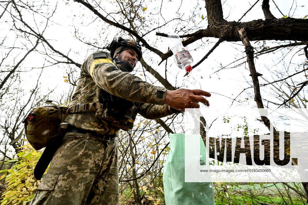 Ukrainian military prepares for winter UKRAINE - NOVEMBER 3, 2022 - A serviceman of the Ukrainian Armed Forces who guards the Zaporizhzhia direction washes his hands, Ukraine. NO USE RUSSIA. NO USE BELARUS. Ukraine