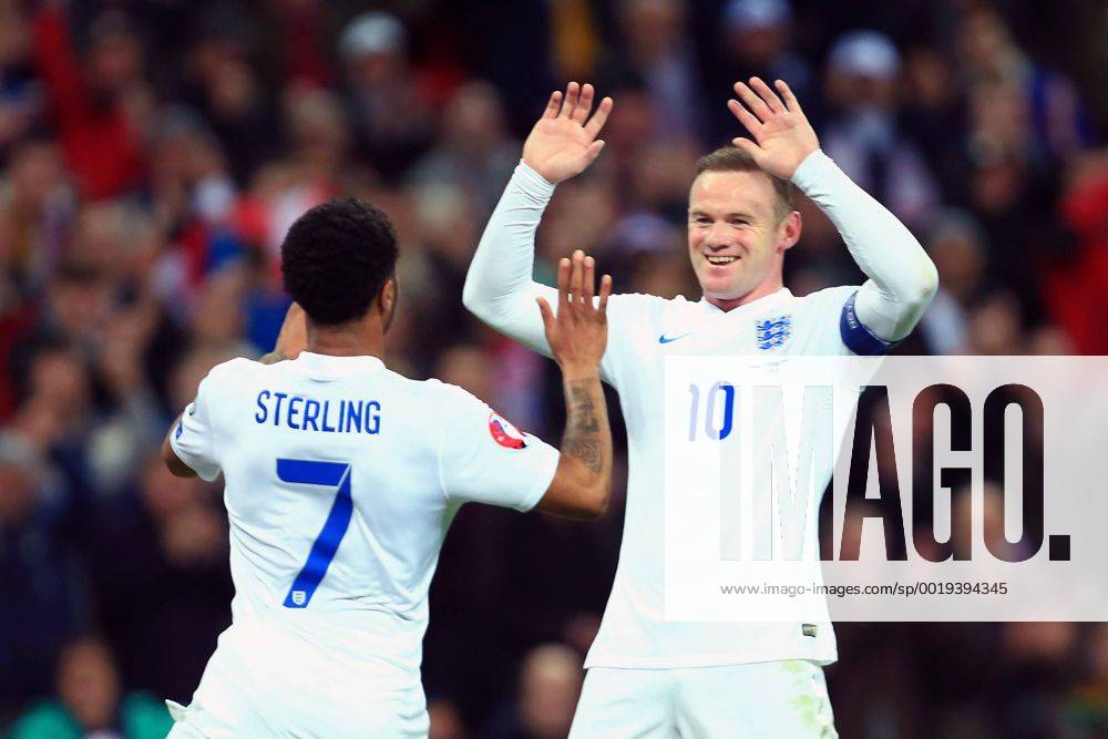 Wayne Rooney of England celebrates with goalscorer Raheem Sterling - England vs. Lithuania - UEFA EURO EM Europameisterschaft Fussball 2016 Qualifier - Wembley Stadium - London - 27 03 2015 Pic Philip Oldham Sportimage .