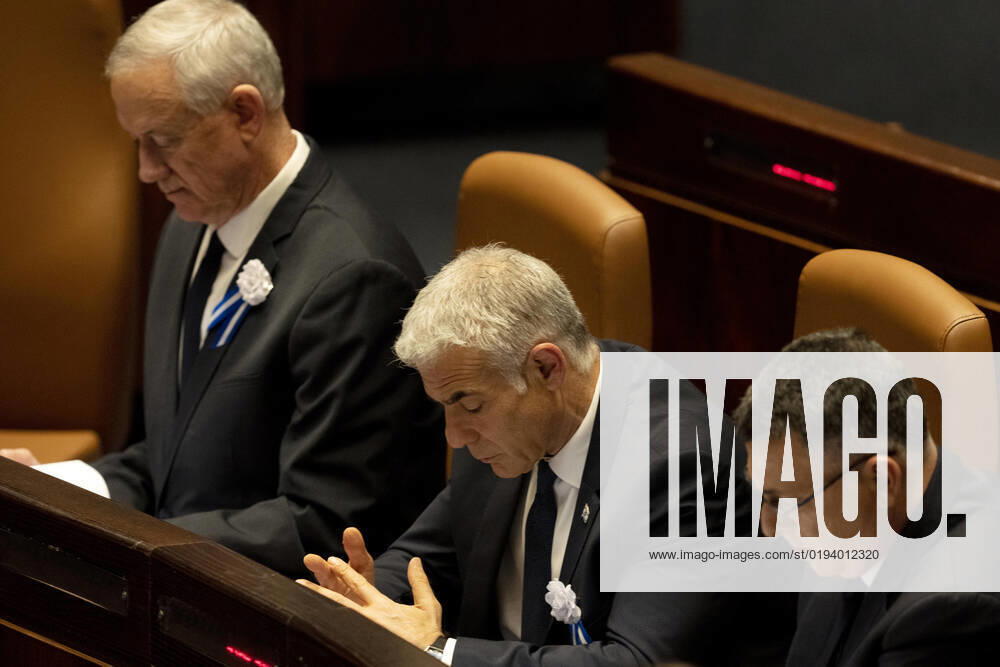 Israel s outgoing Prime Minister Yair Lapid, center, attends the swearing-in ceremony for Israel s government, at the Knesset, or parliament, in Jerusalem, Tuesday, Nov. 15, 2022. Pool JERX20221115109 MayaxAlleruzzo