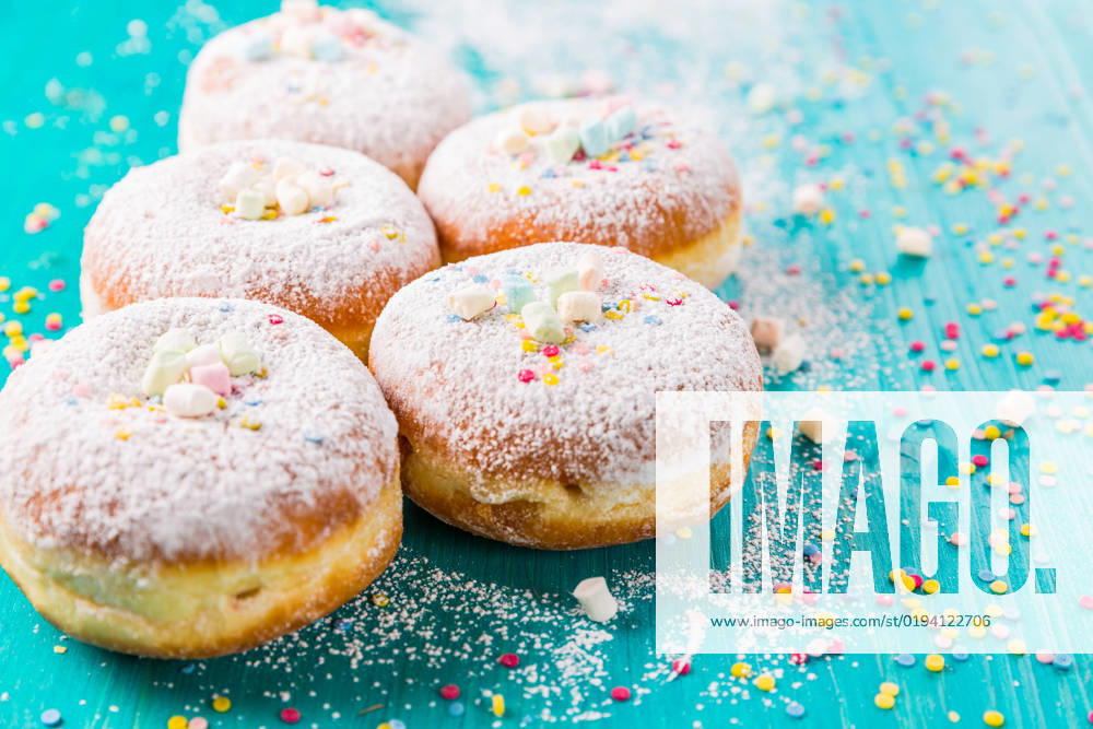 Carnival powdered sugar raised donuts - German Berliner donuts Carnival powdered sugar raised donuts - German Berliner donuts, Krapfen filled with jam