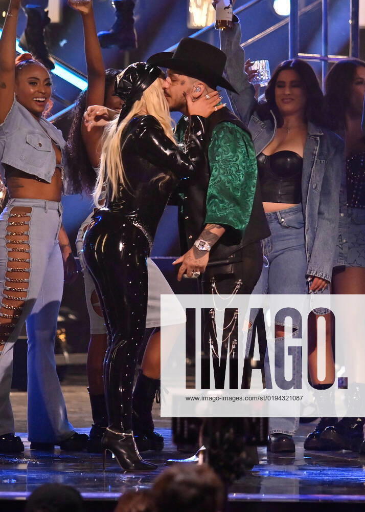 Christina Aguilera (L) and Christian Nodal perform onstage during the 23rd annual Latin Grammy Awards at the Michelob Ultra Arena at Mandalay Bay Resort and Casino in Las Vegas, Nevada on Thursday, November 17, 2022. LAV20221117034 JIMxRUYMEN