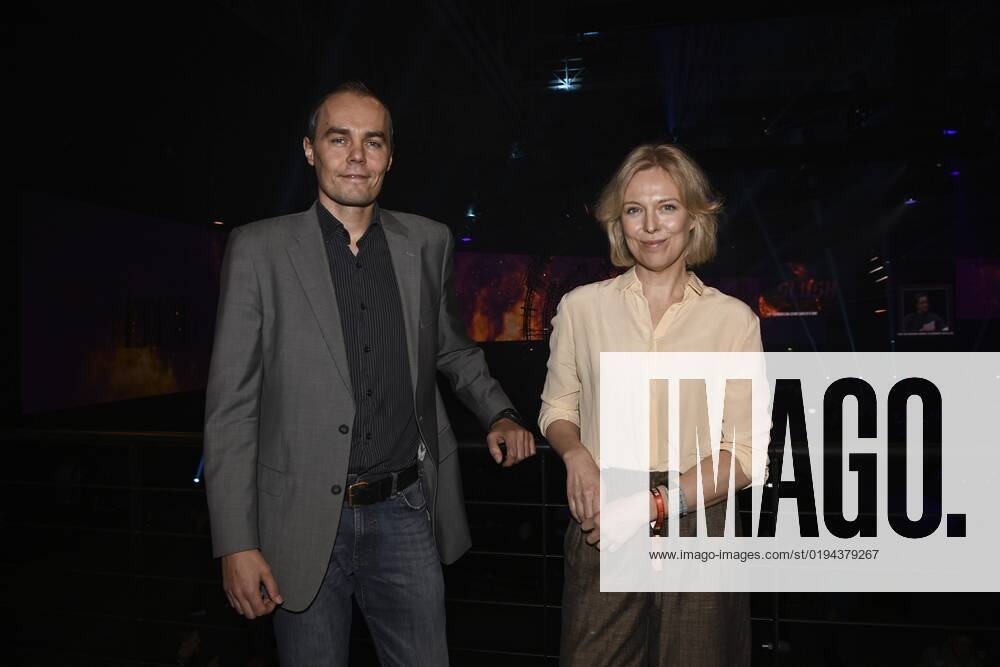 Juliana Harkki (right) and Jukka Planman from Aalto University present hentoTouch, a discreet neuromodulating device for alcohol relapse prevention, at the Slush 2022 Startup Event in Helsinki, Finland on November 18, 2022. Helsinki Finland