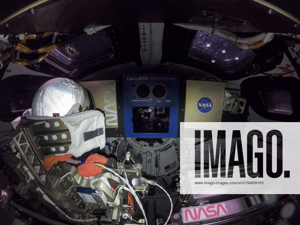 This high-resolution image, taken on November 16, 2022, captures the inside of the Orion crew module on flight day one of the Artemis I mission. At left is Commander Moonikin Campos, a purposeful passenger equipped with sensors to collect data that will help scientists and engineers understand the deep-space environment for future Artemis missions. At the center is the Callisto payload, a technology demonstration of voice-activated audio and video technology from Lockheed Martin in collaboration with Amazon and Cisco. Callisto could assist future astronauts on deep-space missions. Below and to the right of Callisto is the Artemis I zero-gravity indicator, astronaut Snoopy. Artemis I, the first spaceflight in NASA s Artemis program, successf WAX2022112002 NASA