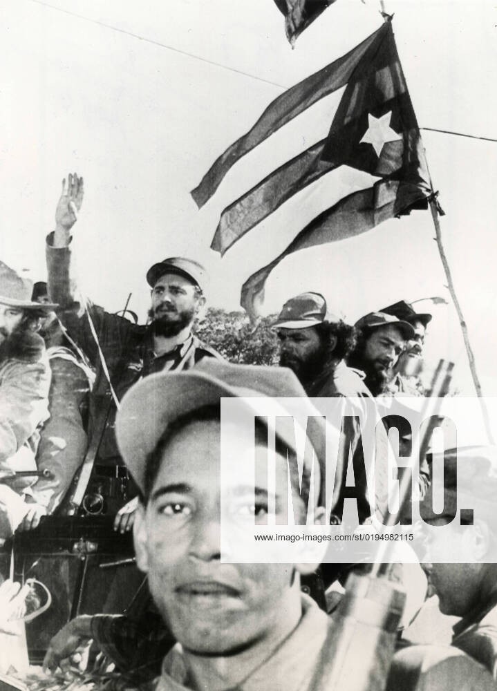 The crowd with Cuban flags greeting Cuban revolutionary Fidel Castro as he enters Havana on January the 8, Cuba 1959