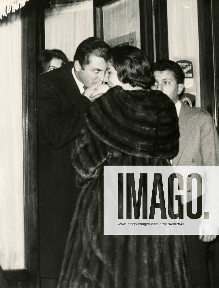 Empress Soraya Esfandiary-Bakhtiary of Iran and Prince Raimondo Orsini kissing her hand, Rome, Italy 1960s
