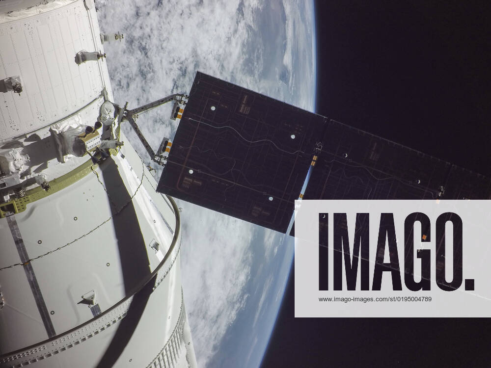 Selfie of the Orion crew capsule with the Earth after deploying one of the solar arrays shortly after launch on flight day one of the NASA Artemis I mission, November 16, 2022, in Earth Orbit. The image was captured by a camera on the tip of one of the solar arrays as it traveled out of the Earthâ€⠢s atmosphere. Earth Orbit Earth Orbit - ZUMAp138 20221116_zaa_p138_083