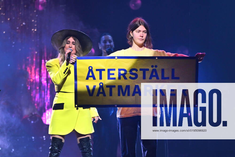 STOCKHOLM 20221125 A protest action Restore the wetlands when Miss Li performs as a guest artist during Friday nights final of Idol in Tele2 Arena Stockholm Sweden