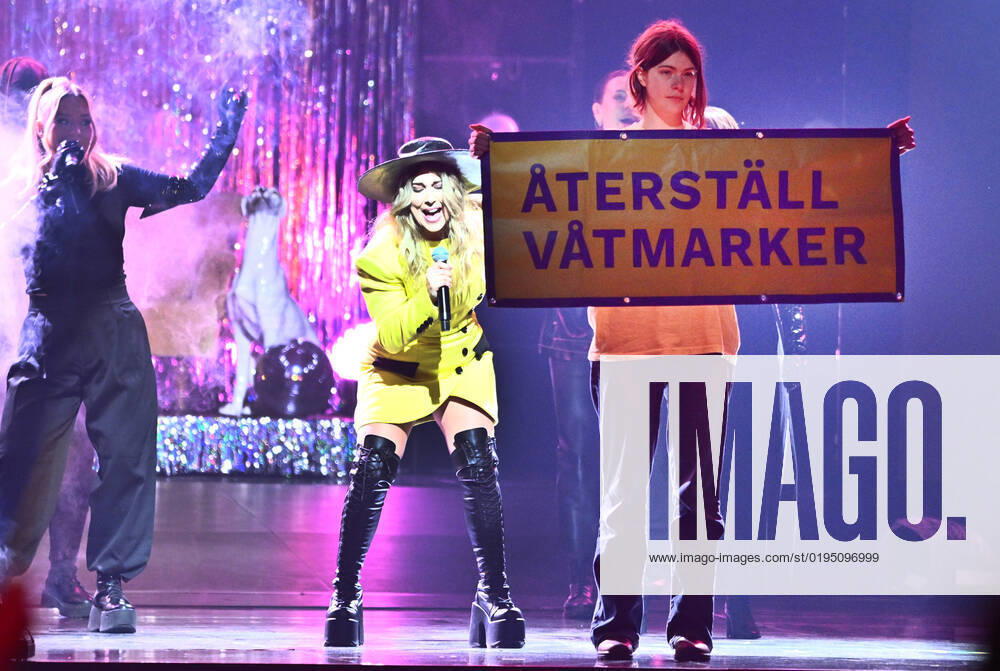 STOCKHOLM 20221125 A protest action Restore the wetlands when Miss Li performs as a guest artist during Friday nights final of Idol in Tele2 Arena Stockholm Sweden