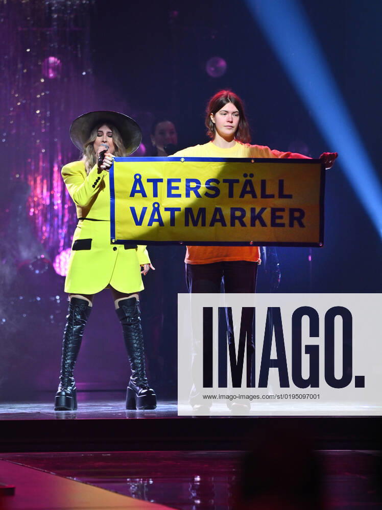 STOCKHOLM 20221125 A protest action Restore the wetlands when Miss Li performs as a guest artist during Friday nights final of Idol in Tele2 Arena Stockholm Sweden