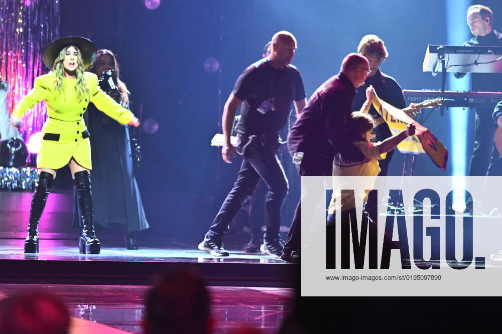 STOCKHOLM 20221125 A protest action Restore wetlands comes on stage when Miss Li performs as a guest artist during Friday nights Idol final in Tele2 Arena Stockholm Sweden