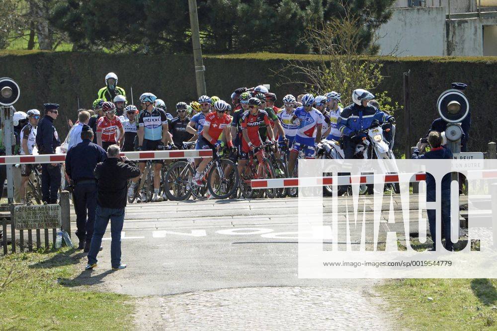 - ROUBAIX, FRANCE: Riders are blocked at a rail barrier at the Paris-Roubaix one day cycling race, 253,5 km from Compiegne to the Velodrome in Roubaix, Sunday 12 April 2015. DIRKxWAEM x04603019x