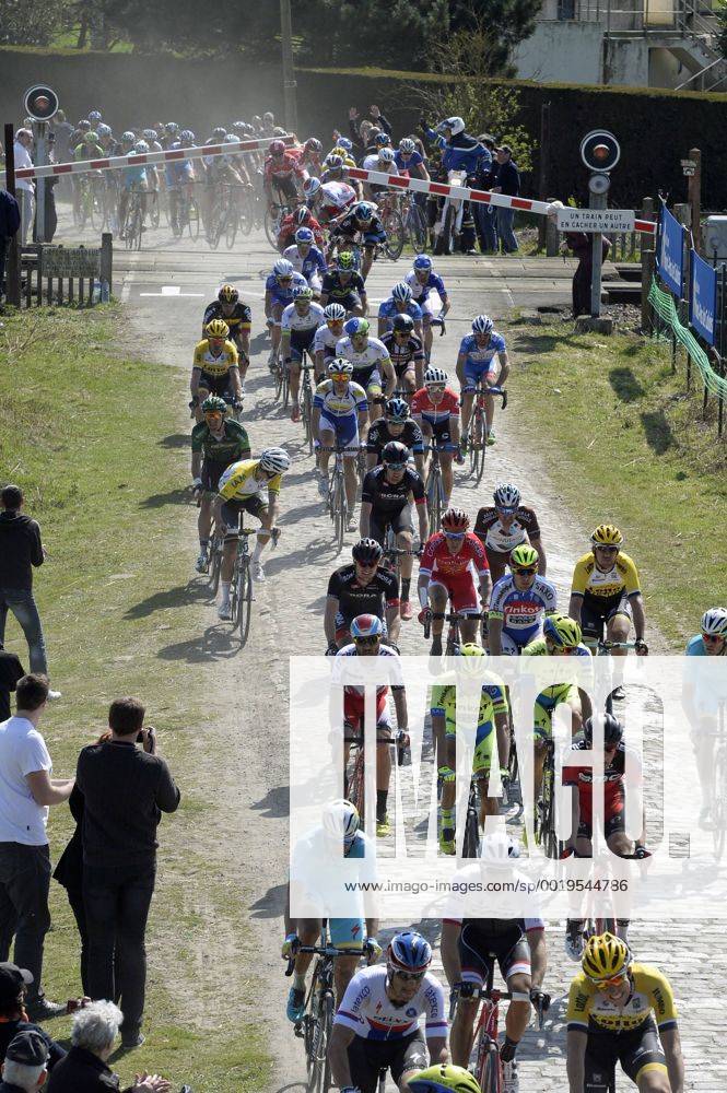 - ROUBAIX, FRANCE: Riders ride through a closed rail barrier at the Paris-Roubaix one day cycling race, 253,5 km from Compiegne to the Velodrome in Roubaix, Sunday 12 April 2015. DIRKxWAEM x04603021x
